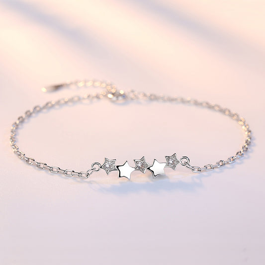 Elegant Armband med stjärna featuring shimmering stars, perfect for women and special gifts from XINGX.