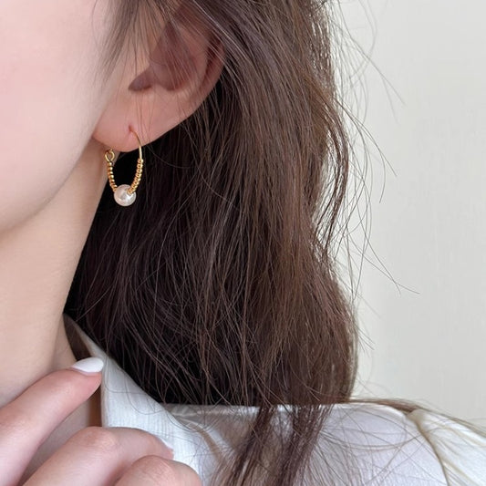 Örhängen ringar med pärlor