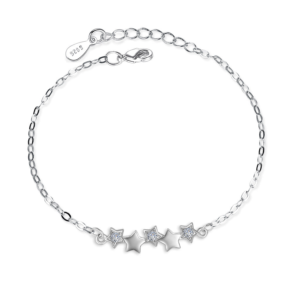 Elegant Armband med stjärna in copper-plated platinum, featuring sparkling stars, perfect for women's gifts.