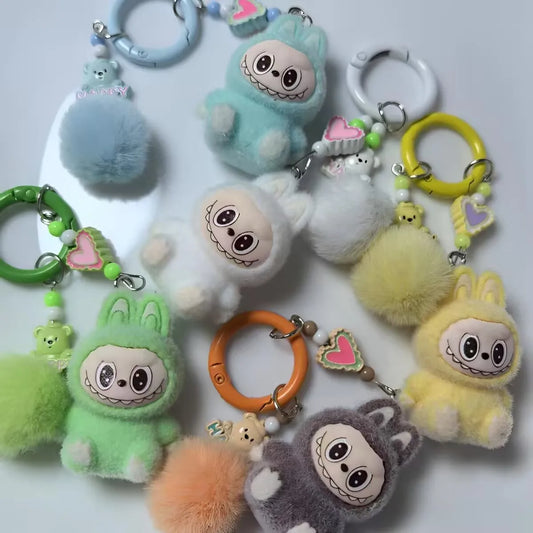 Små söta nyckelringar i plysch