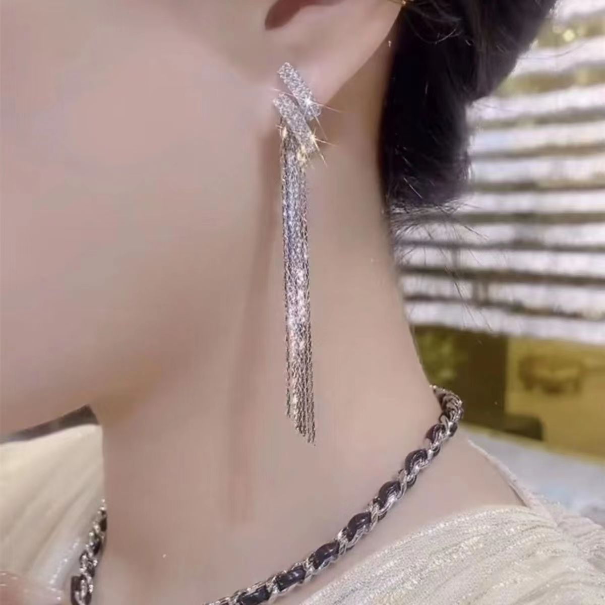 Tassel örhängen med stjärnor