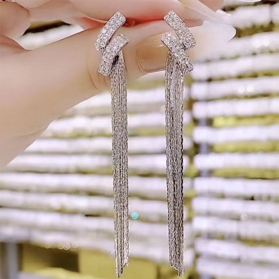 Tassel örhängen med stjärnor